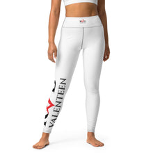 Load image into Gallery viewer, Image of the front view of a model wearing a high quality and flattering fit premium white legging,  that pops with color on one side of the lower leg from  the dramatic  black and red logo which has been designed by Red Valenteen.