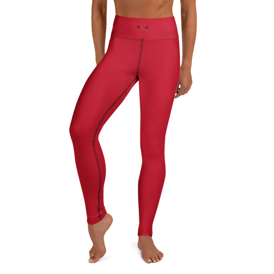 A model wearing high-waisted red athletic leggings with "Red Valenteen" contrast stitching and a small "Red logo on the waistband, shown against a plain white background.