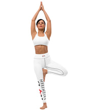 Load image into Gallery viewer, Image of a model standing straight with arms up in a yoga pose wearing white chic Red Valenteen leggings and white crop top for a clean minimalist look