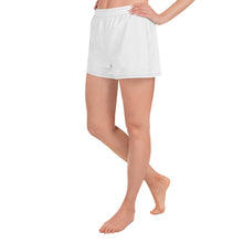 Load image into Gallery viewer, image of model from waist down, wearing white comfortable fit shorts, in breathable recycled material, with a contrast stitch at hem line and waist line.