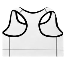 Load image into Gallery viewer, A lay flat image of the back view of the white sports bra with modern racer back style and contrasting black trim contour around the neck line and arm holes, and contrast stitching in black to give a modern chic edge.