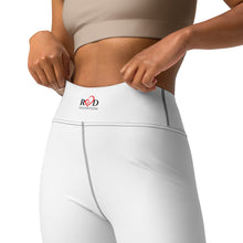 Load image into Gallery viewer, An image of the waist and hip area of a model  who is wearing the sleek design  and perfect fit of white leggings with  the Red Valenteen logo on the waist band.