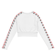 Load image into Gallery viewer, Lay flat image of the back view of the Red Valenteen white crop woman's active wear sports top featuring eye popping red and black logo pattern down both sleeves.