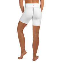 Load image into Gallery viewer, Back view image of white beautifully designed quality stretch white shorts for sport, yoga, pilates, running or daywear. Shorts are mid thigh in length with small beating red heart logo centre of the back waistband.
