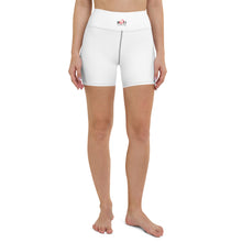 Load image into Gallery viewer, Image of woman model from the waist down showcasing the Red Valenteen white tight fit activewear shorts for any features contrast stitching on seems for a chic shar  look, together with the small logo centred on the waist band.