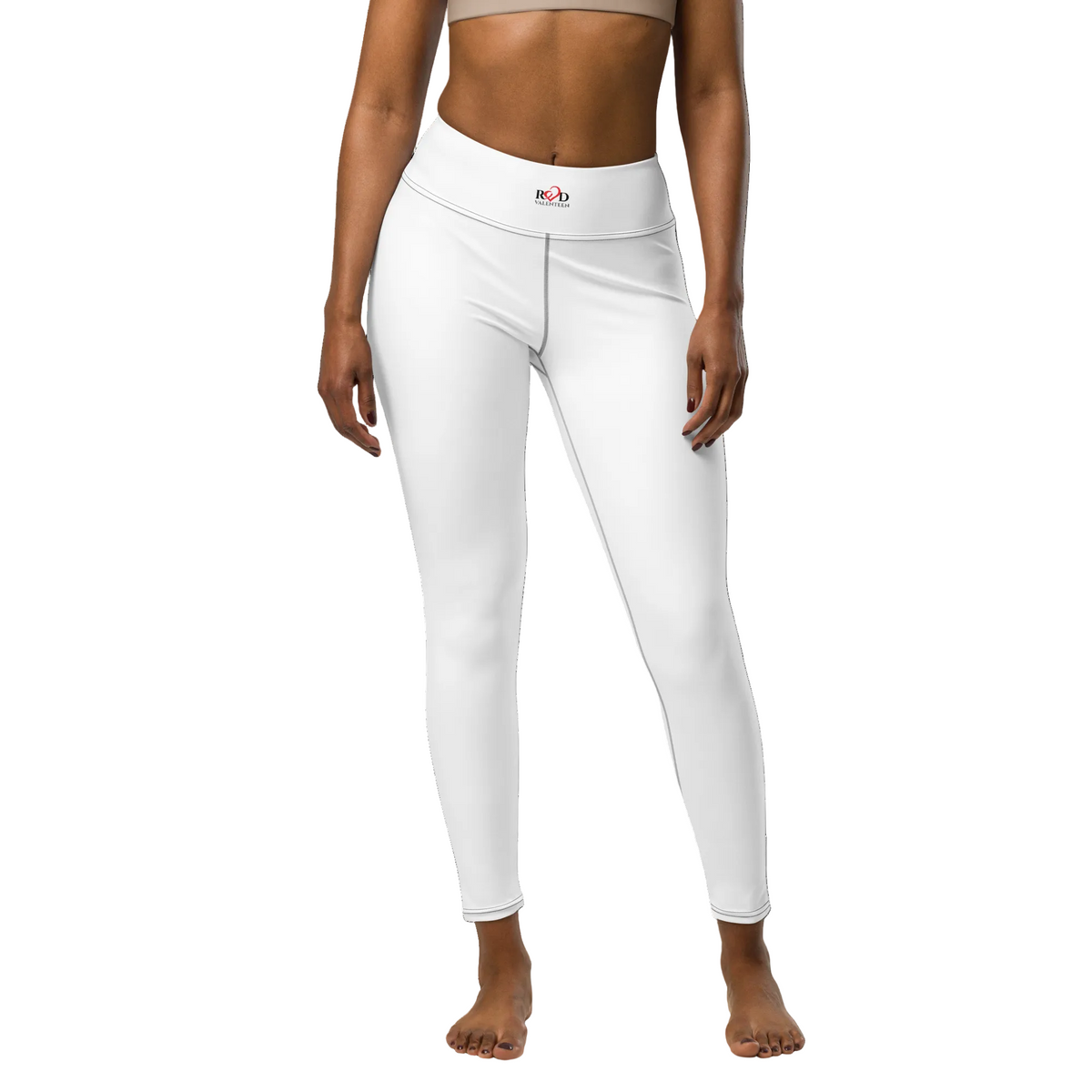 White leggings front view on a model, with a small Red Valenteen logo centre waistband, on a white background.