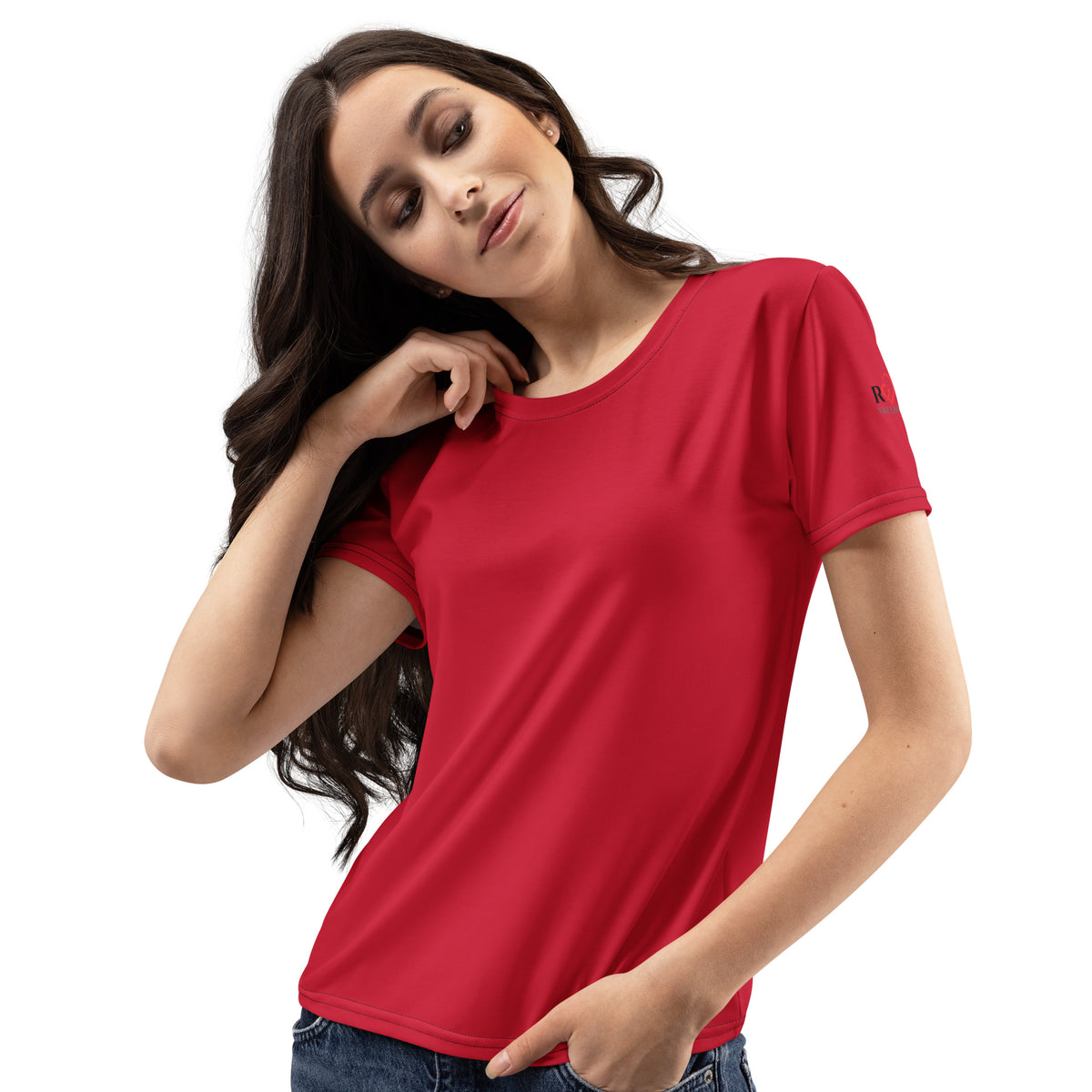 A woman wearing a bright red short-sleeve crewneck t-shirt, with small Red Valenteen logo on left shoulder, posing against a solid white background.
