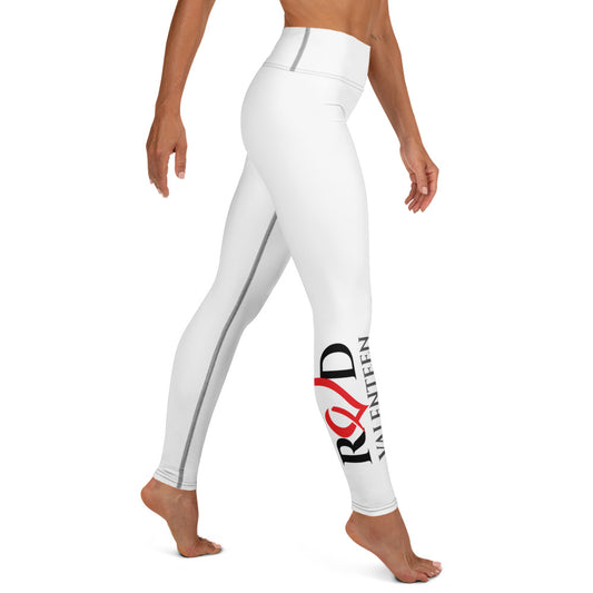 White high-waisted athletic leggings shown on a model from the side, featuring a vertical gray stitch down the side and a graphic print on the lower leg with the text 'RED VALENTIEEN in black and red.