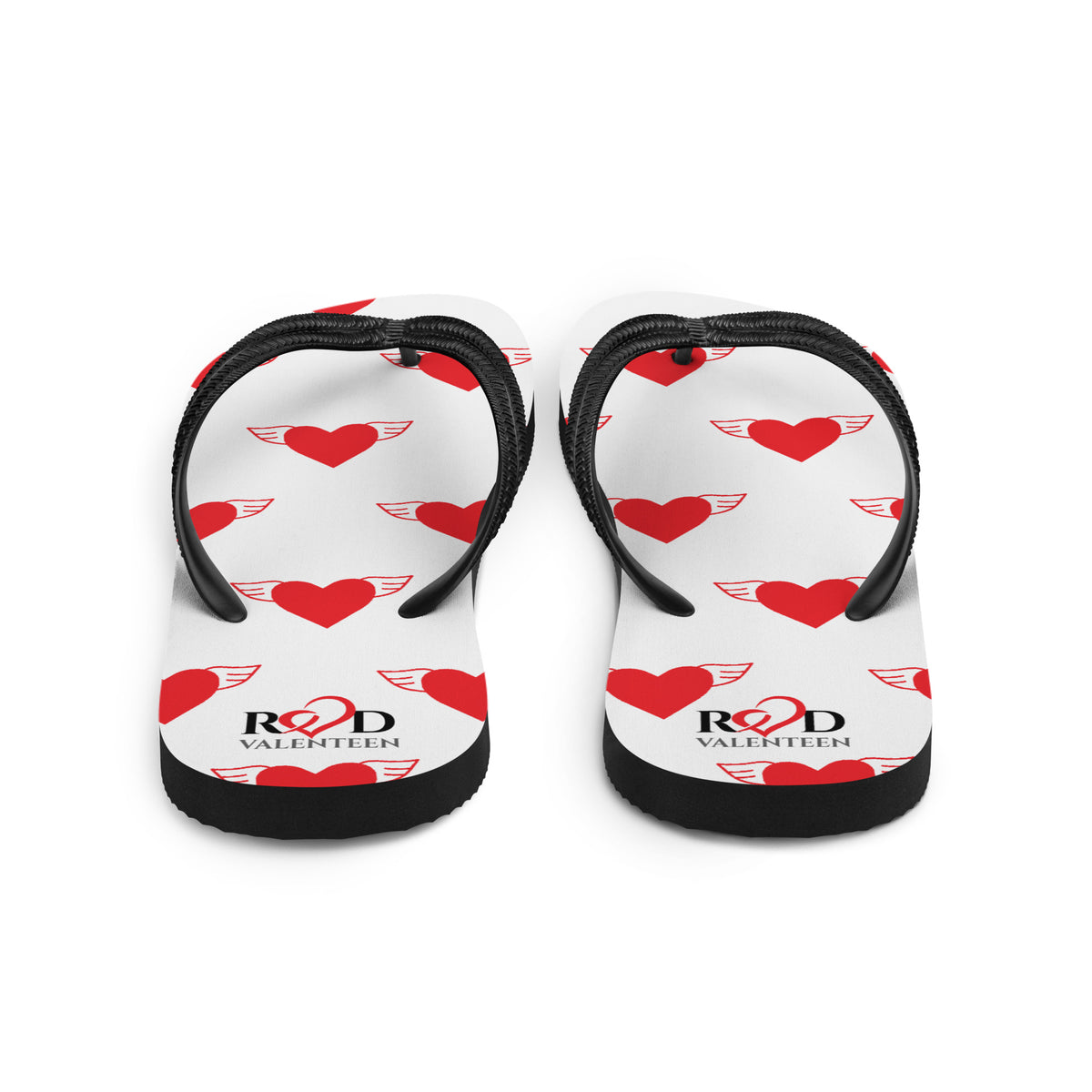 A pair of white flip-flops with black straps, featuring a repeating pattern of red hearts with wings and the text 'Red Valentee'n' logo.