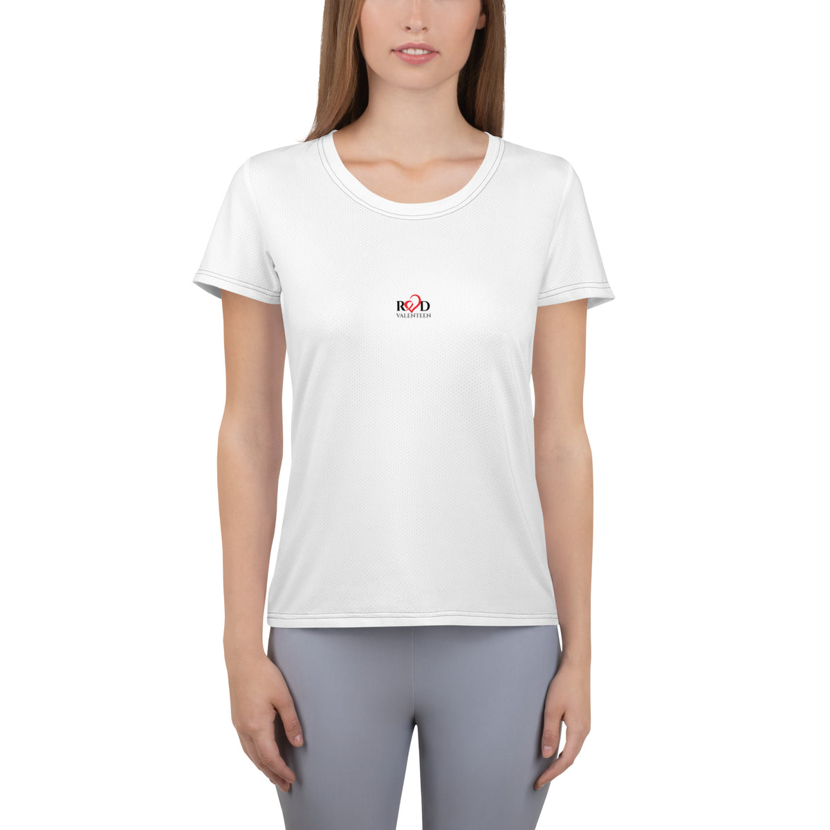 Person wearing a white t-shirt with a small Red Valenteen logo mid chest and gray leggings on a white background