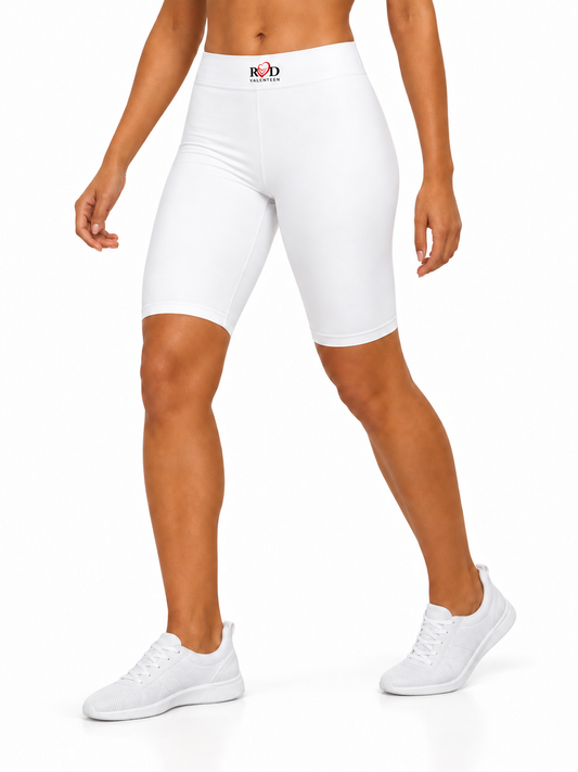White high-waisted biker shorts with a small red and black 'Red Valenteen ' logo on the front waistband, modeled on a person against a clean white background.